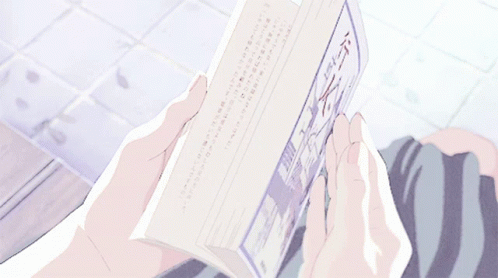 Anime girl flipping through a book